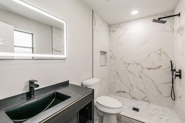 1103 Teakwood Dr, Duncanville, TX 75137 - full bathroom with vanity, toilet, and a marble finish shower