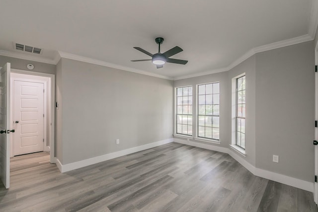 1103 Teakwood Dr, Duncanville, TX 75137 - empty room featuring ceiling fan, baseboards, wood finished floors, and ornamental molding