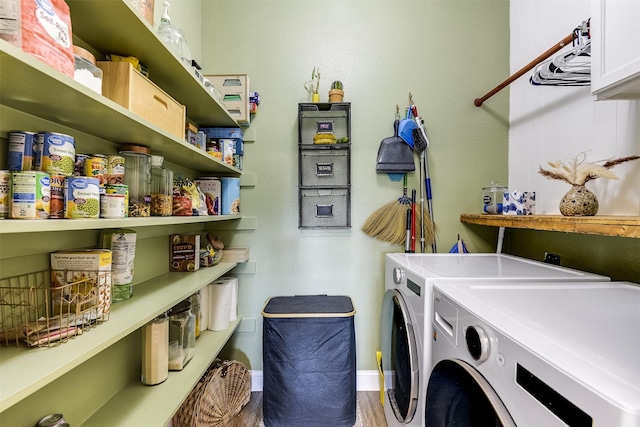 712 Saddleway Dr, Fort Worth, TX 76179 - washroom featuring washer and clothes dryer, cabinet space, and wood finished floors