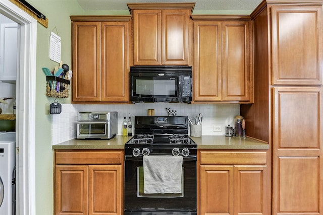 712 Saddleway Dr, Fort Worth, TX 76179 - kitchen with black appliances, backsplash, brown cabinets, and washer / clothes dryer