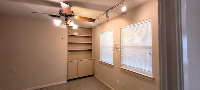 6121 Over Lake Dr, Fort Worth, TX 76135 - empty room with a ceiling fan, light colored carpet, baseboards, and rail lighting