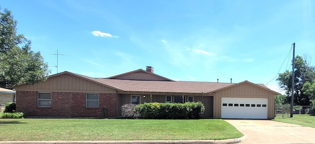6121 Over Lake Dr, Fort Worth, TX 76135 - ranch-style house featuring a garage, a front yard, driveway, a chimney, and brick siding