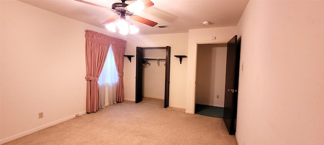 6121 Over Lake Dr, Fort Worth, TX 76135 - unfurnished bedroom featuring light carpet, a closet, baseboards, and a ceiling fan
