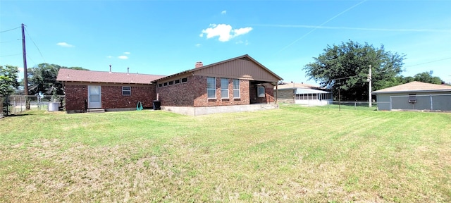 6121 Over Lake Dr, Fort Worth, TX 76135 - back of house featuring brick siding, a chimney, and cooling unit