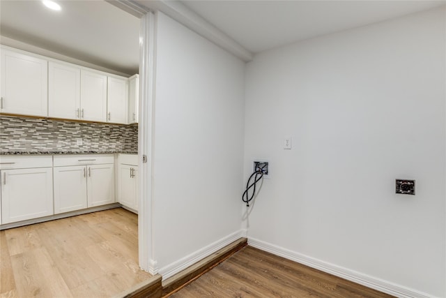 202 Kenway St, Rockwall, TX 75087 - laundry area with light wood-type flooring, washer hookup, and baseboards