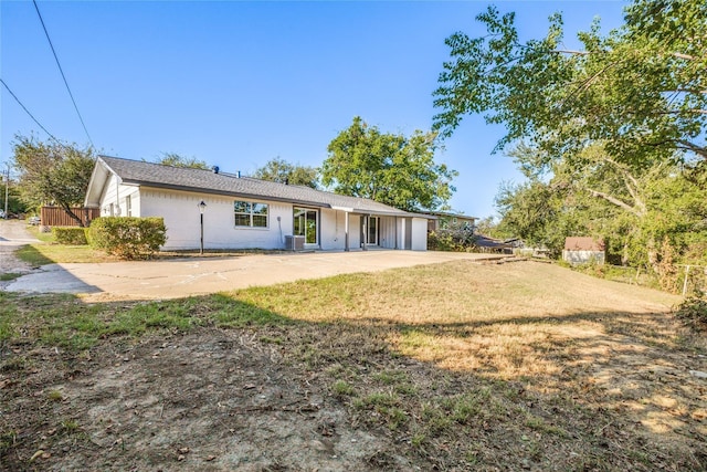 202 Kenway St, Rockwall, TX 75087 - back of house with a yard