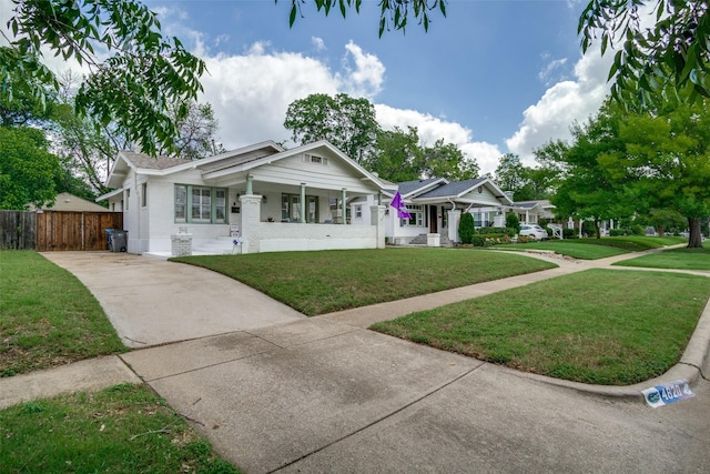 4820 Pershing Ave, Fort Worth, TX 76107 - view of front of home with driveway, covered porch, and brick siding