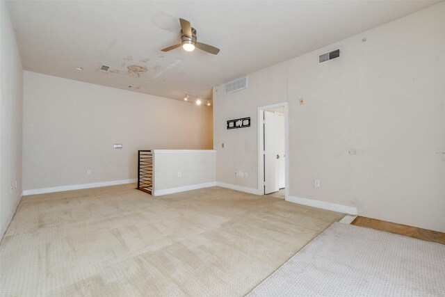 4414 Cedar Springs Rd Unit 226, Dallas, TX 75219 - spare room with ceiling fan, light colored carpet, and baseboards