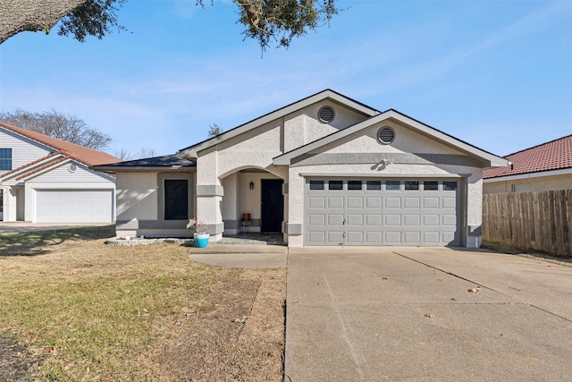 2313 Harvest Glen Ct, Fort Worth, TX 76108 - ranch-style home featuring driveway, a garage, and stucco siding