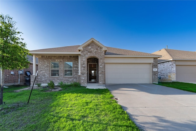 1236 Sequoia Ln, Princeton, TX 75407 - single story home with an attached garage, concrete driveway, brick siding, a front lawn, and a shingled roof