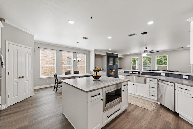 3516 Horace Ave, Fort Worth, TX 76244 - kitchen featuring a sink, appliances with stainless steel finishes, recessed lighting, a center island, and hanging light fixtures