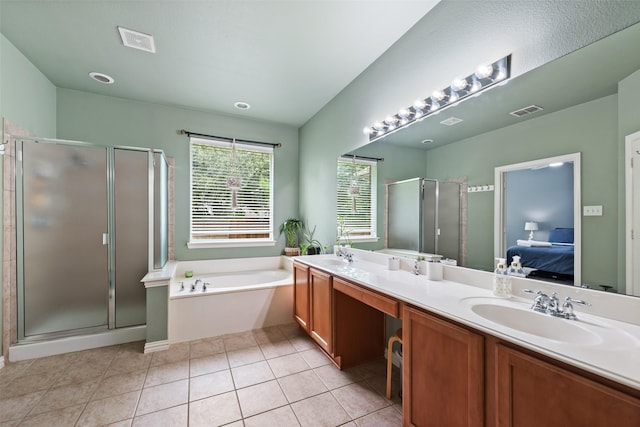 3516 Horace Ave, Fort Worth, TX 76244 - ensuite bathroom featuring a garden tub, a stall shower, double vanity, and tile patterned flooring