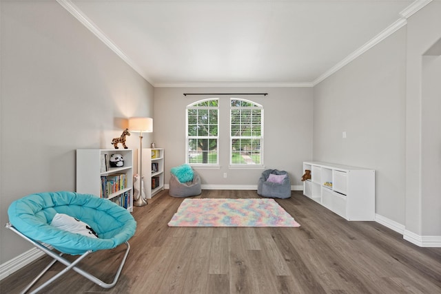 3516 Horace Ave, Fort Worth, TX 76244 - living area featuring wood finished floors, crown molding, and baseboards