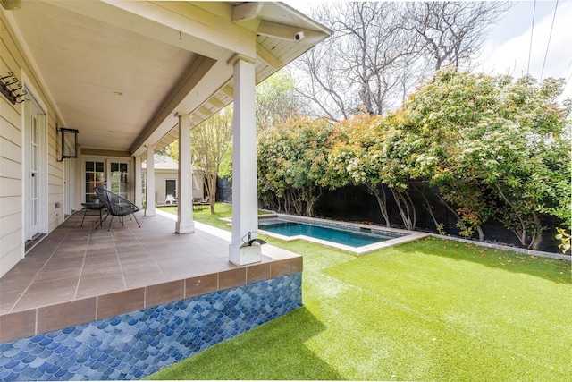 7107 La Vista Dr, Dallas, TX 75214 - view of green lawn with a patio area and an outdoor pool