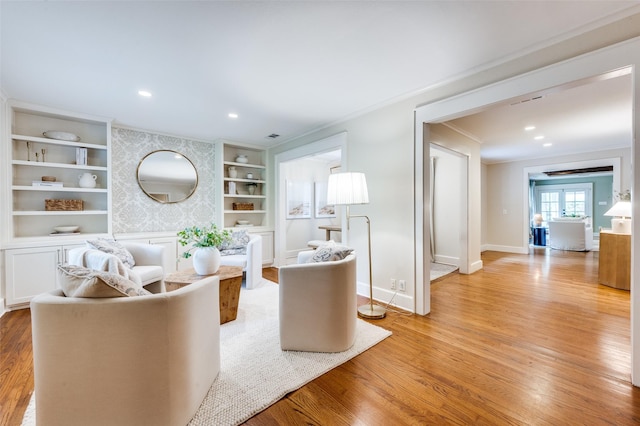 7107 La Vista Dr, Dallas, TX 75214 - living room with ornamental molding, wood finished floors, built in shelves, baseboards, and recessed lighting
