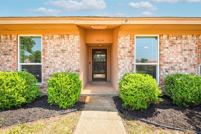1654 Clarendon Dr, Lewisville, TX 75067 - entrance to property featuring brick siding