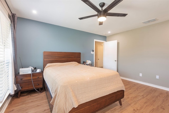 1654 Clarendon Dr, Lewisville, TX 75067 - bedroom featuring light wood-type flooring, baseboards, a ceiling fan, and recessed lighting