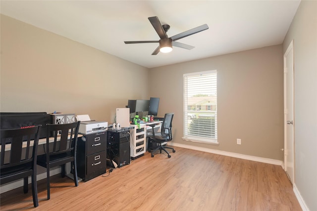1654 Clarendon Dr, Lewisville, TX 75067 - home office with wood finished floors, ceiling fan, and baseboards