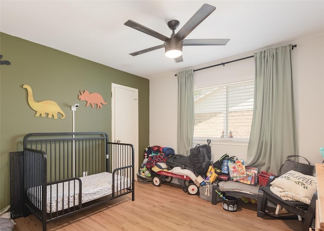 1654 Clarendon Dr, Lewisville, TX 75067 - bedroom featuring wood finished floors and ceiling fan