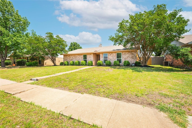 1654 Clarendon Dr, Lewisville, TX 75067 - ranch-style home with a chimney and central AC