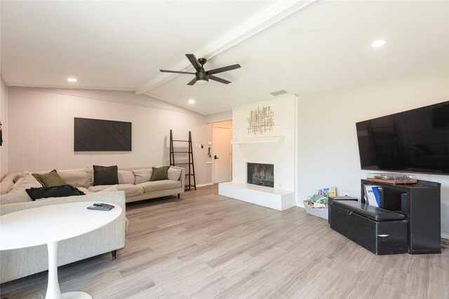 1654 Clarendon Dr, Lewisville, TX 75067 - living area with a ceiling fan, wood finished floors, a fireplace, and recessed lighting