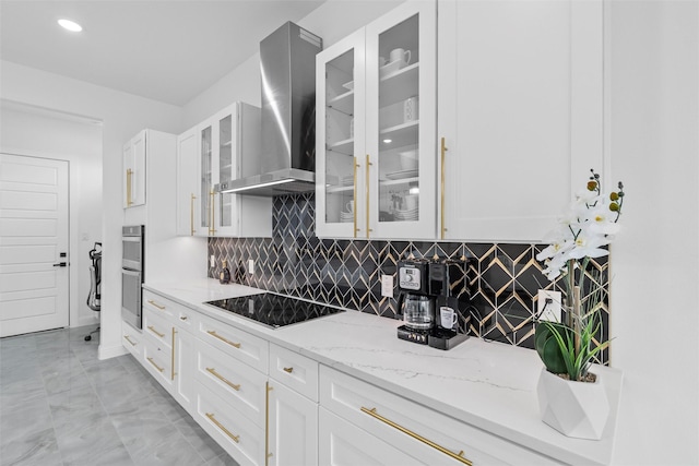 3620 Quail Ln, Arlington, TX 76016 - kitchen featuring wall chimney range hood, black electric stovetop, stainless steel double oven, and white cabinets