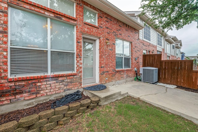 7001 Van Gogh Dr, Plano, TX 75093 - view of patio featuring central air condition unit