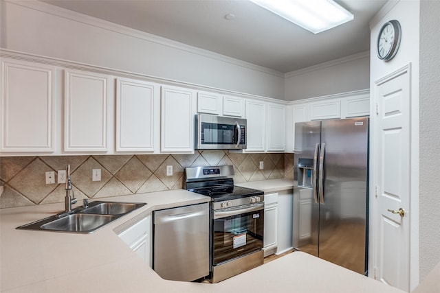 7001 Van Gogh Dr, Plano, TX 75093 - kitchen featuring appliances with stainless steel finishes, a sink, white cabinetry, backsplash, and light countertops