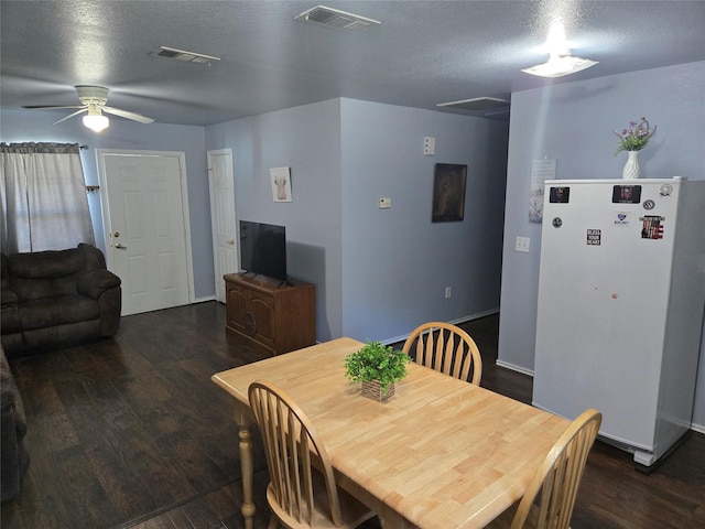 306 S Allen St, Boyd, TX 76023 - dining room featuring ceiling fan, wood finished floors, and a textured ceiling