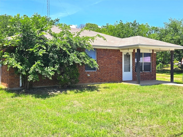 306 S Allen St, Boyd, TX 76023 - rear view of property with a yard and brick siding