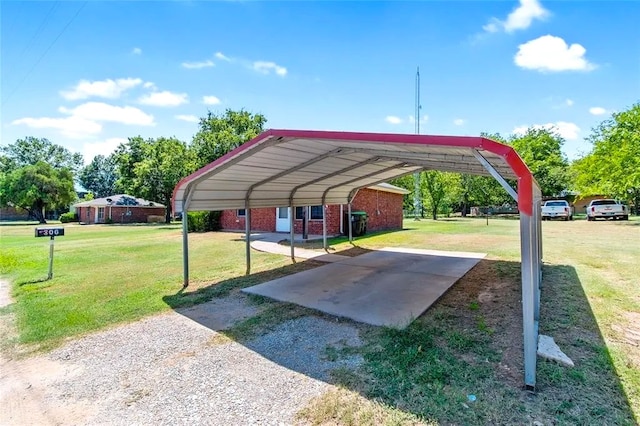 306 S Allen St, Boyd, TX 76023 - view of parking featuring a carport