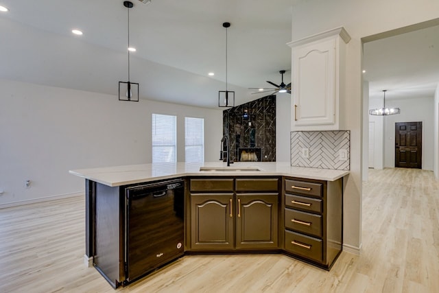 15525 Western Trl, Frisco, TX 75035 - kitchen featuring black dishwasher, white cabinets, light wood-style flooring, light countertops, and recessed lighting
