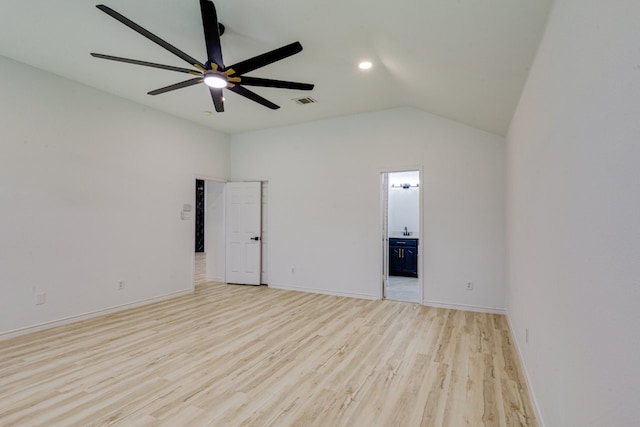 15525 Western Trl, Frisco, TX 75035 - empty room featuring light wood finished floors, lofted ceiling, ceiling fan, and baseboards