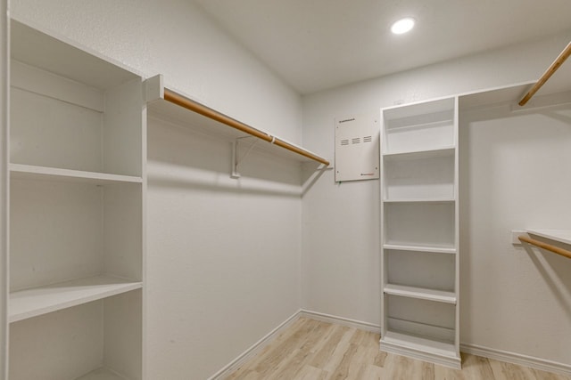 15525 Western Trl, Frisco, TX 75035 - spacious closet with wood finished floors