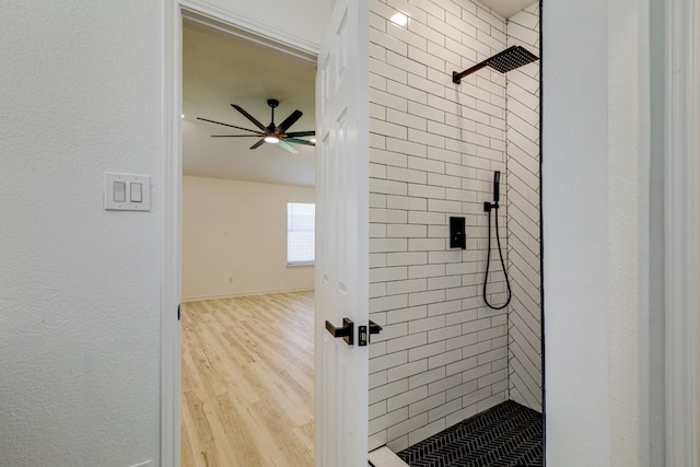 15525 Western Trl, Frisco, TX 75035 - bathroom featuring a stall shower, wood finished floors, a ceiling fan, and baseboards