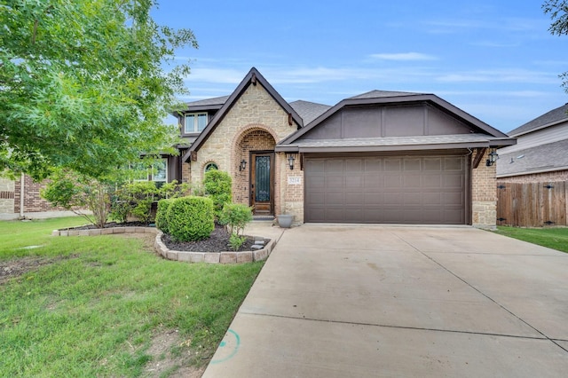 3214 Paisley Dr, Midlothian, TX 76065 - view of front of home featuring brick siding, stone siding, concrete driveway, and an attached garage