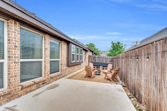 3214 Paisley Dr, Midlothian, TX 76065 - fenced backyard with a patio area