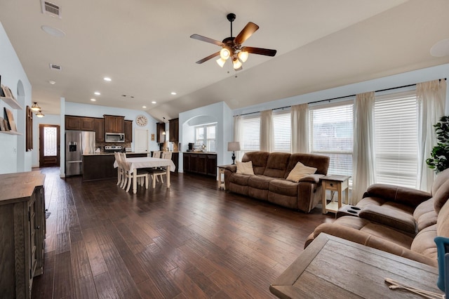 3214 Paisley Dr, Midlothian, TX 76065 - living area with ceiling fan, lofted ceiling, dark wood-type flooring, recessed lighting, and arched walkways