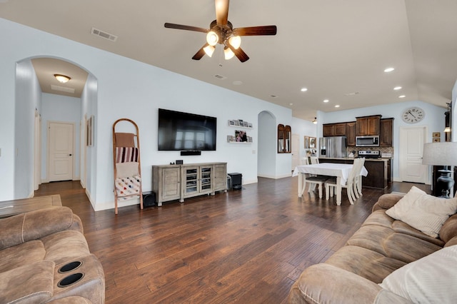 3214 Paisley Dr, Midlothian, TX 76065 - living area featuring arched walkways, ceiling fan, recessed lighting, dark wood-style flooring, and vaulted ceiling