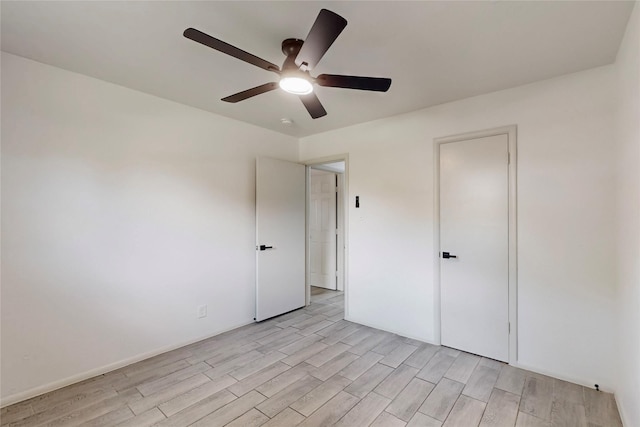 409 Fleming Dr, Hurst, TX 76053 - unfurnished bedroom featuring light wood-style flooring and a ceiling fan