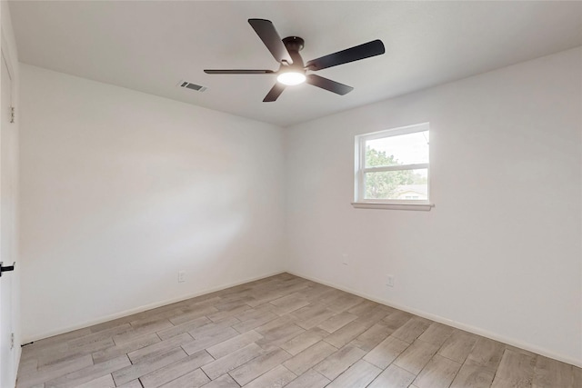 409 Fleming Dr, Hurst, TX 76053 - unfurnished room with light wood-style flooring and a ceiling fan