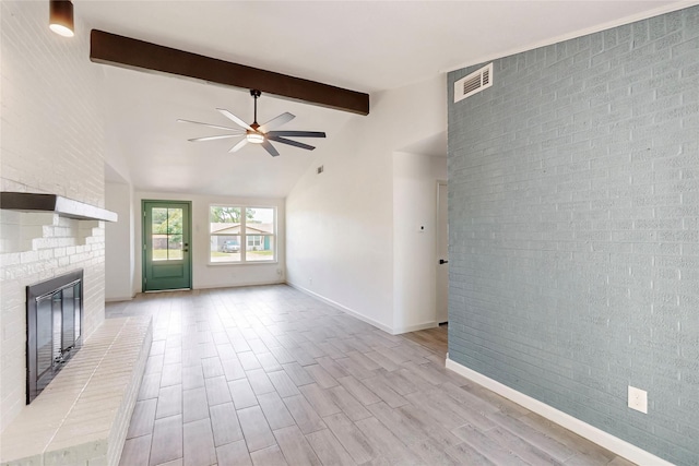 409 Fleming Dr, Hurst, TX 76053 - unfurnished living room featuring a ceiling fan, a fireplace, light wood-style floors, and baseboards