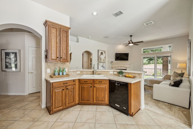 308 Wrangler Dr, Fairview, TX 75069 - kitchen featuring dishwasher, a sink, open floor plan, a ceiling fan, and light countertops