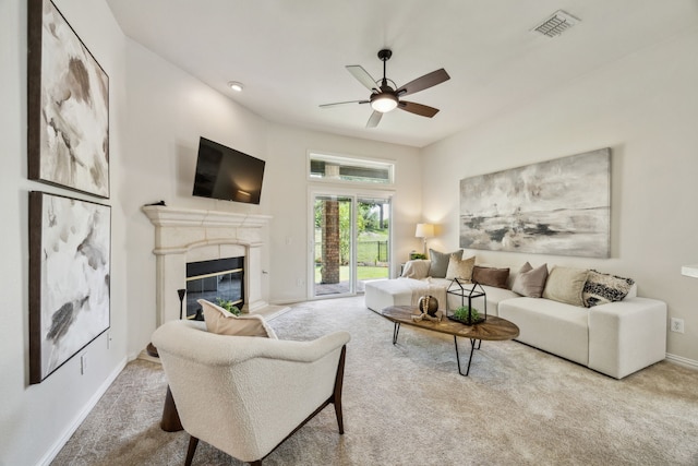 308 Wrangler Dr, Fairview, TX 75069 - carpeted living area featuring ceiling fan, a high end fireplace, and baseboards