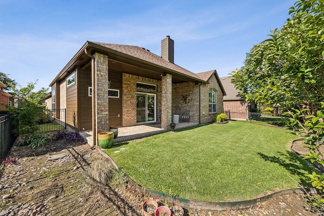 308 Wrangler Dr, Fairview, TX 75069 - back of property featuring a chimney and a patio area