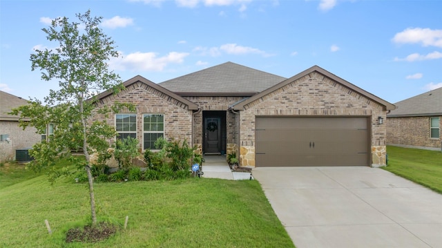 1312 Honeysuckle Dr, Josephine, TX 75189 - view of front of home featuring a garage, a front yard, driveway, roof with shingles, and brick siding