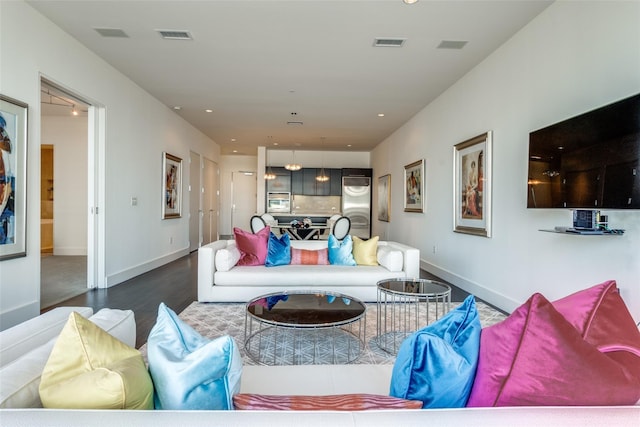 2200 Victory Ave Unit 701, Dallas, TX 75219 - living room featuring baseboards, wood finished floors, and recessed lighting