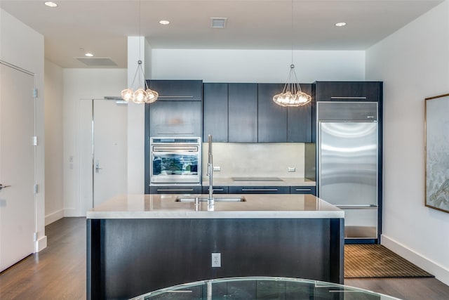 2200 Victory Ave Unit 701, Dallas, TX 75219 - kitchen featuring a chandelier, built in refrigerator, dark wood-style floors, baseboards, and recessed lighting