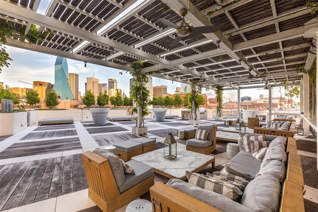 2200 Victory Ave Unit 701, Dallas, TX 75219 - view of patio / terrace featuring an outdoor hangout area, a skyline view, and a wooden deck