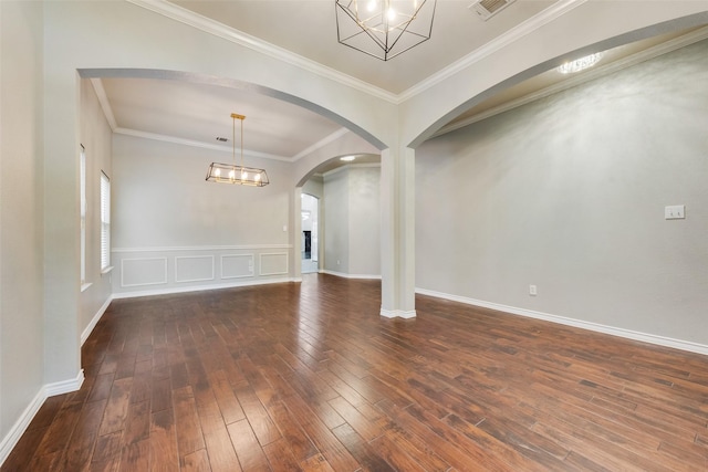 13293 Grayhawk Blvd, Frisco, TX 75033 - unfurnished room with dark wood finished floors, arched walkways, a chandelier, ornamental molding, and baseboards